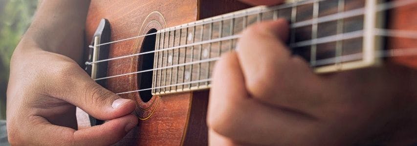 How to Play Ukulele in 6 Easy Steps guide cover image