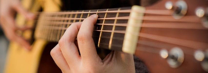 How To String a Guitar guide cover image